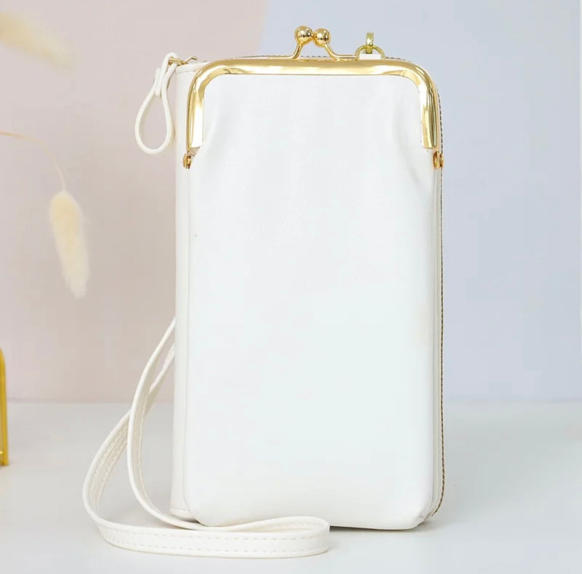 Sac de téléphone blanc doré  Maison Eba